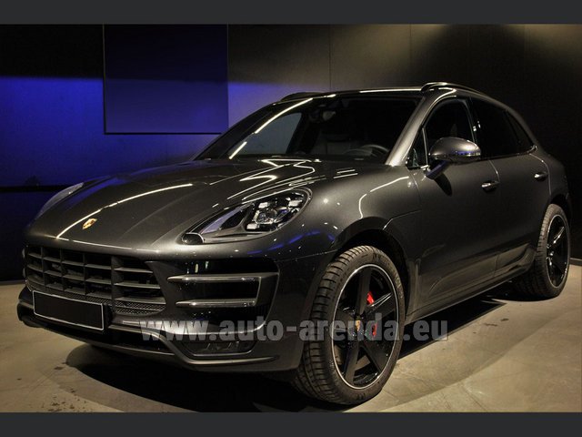 Rental Porsche Macan Turbo Performance Package LED Sportabgas in the München Train Station